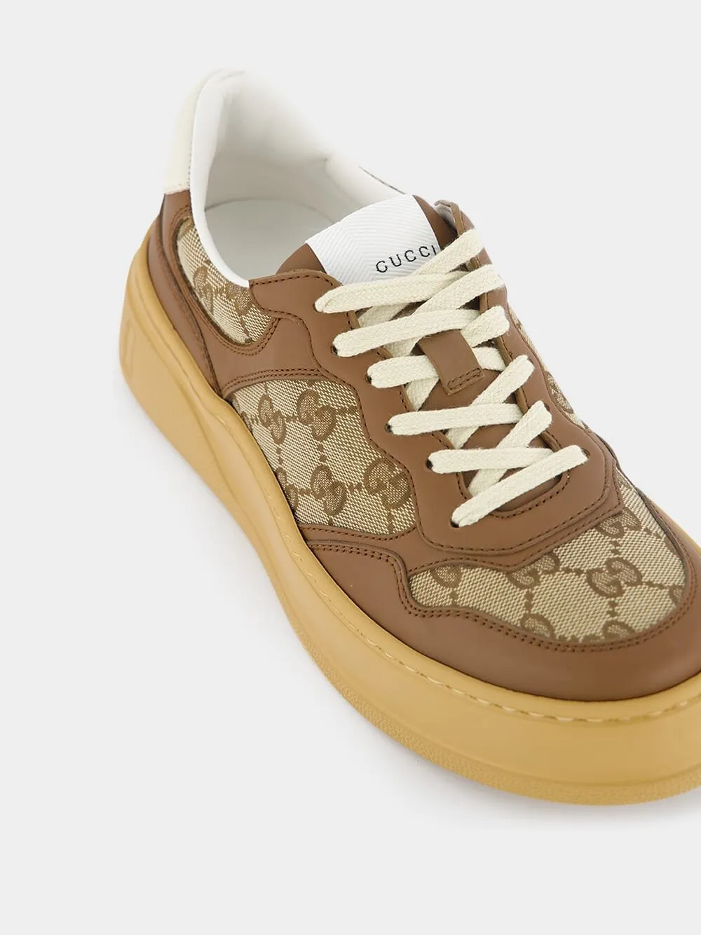GG Embossed Low-Top Sneakers